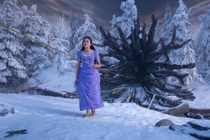 Mackenzie Foy in a snowy forest