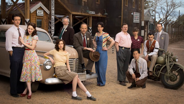 Rachel Brosnahan and cast in period costumes