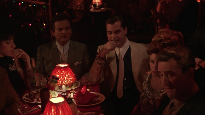 Ray Liotta and others at a dinner table