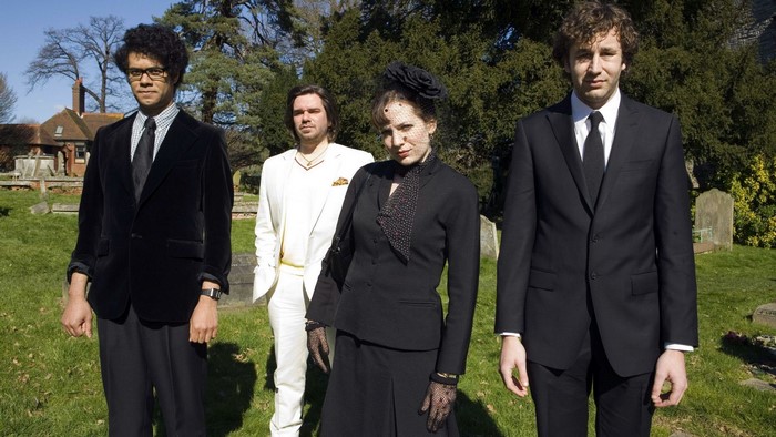 Richard Ayoade and friends at a funeral