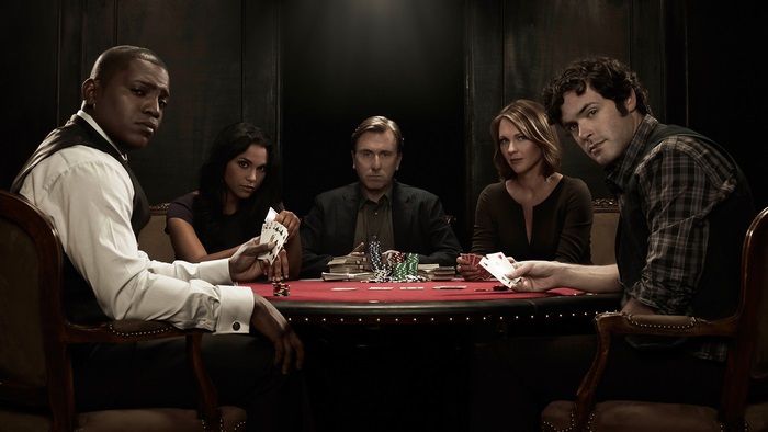 Tim Roth and cast playing poker