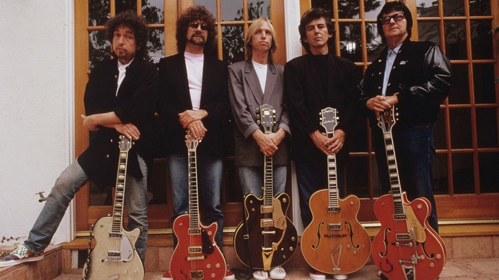 The Traveling Wilburys with guitars