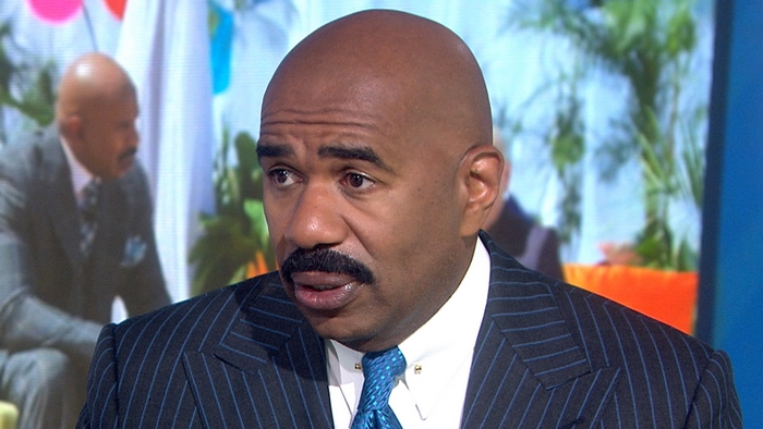 Steve Harvey in a suit