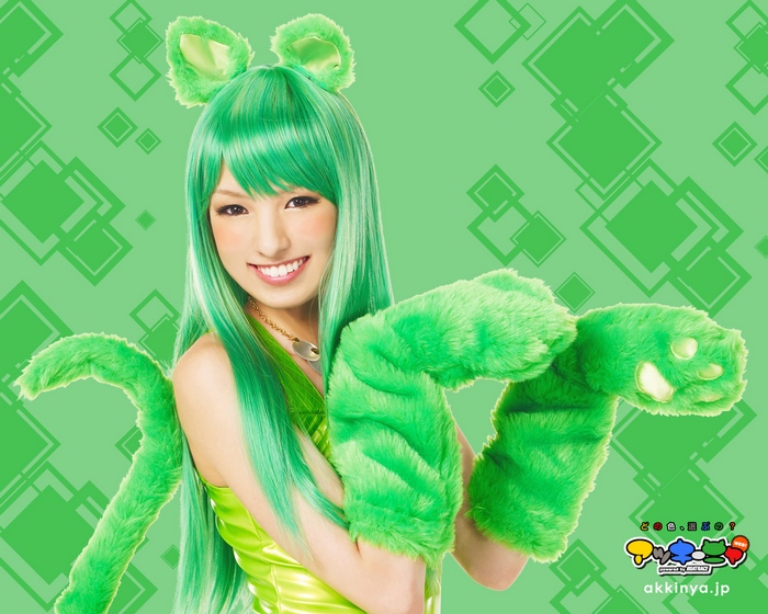 Akina Minami in green costume with cat ears and tail