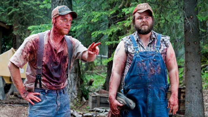 Alan Tudyk and another man covered in blood
