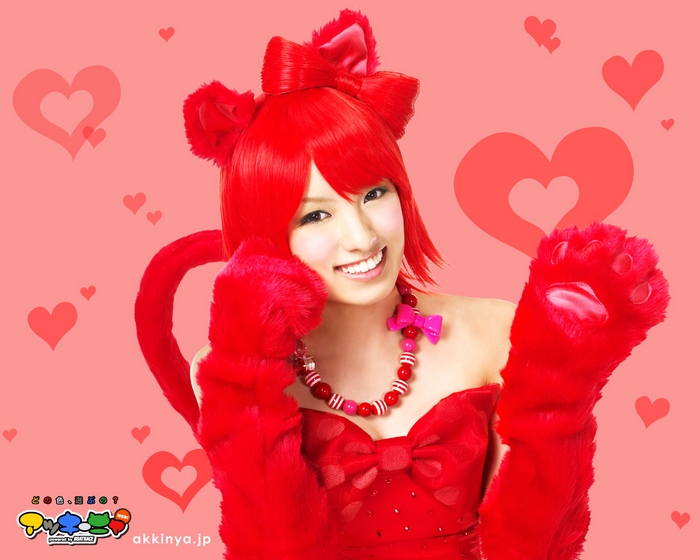 Akina Minami in red cat costume with hearts