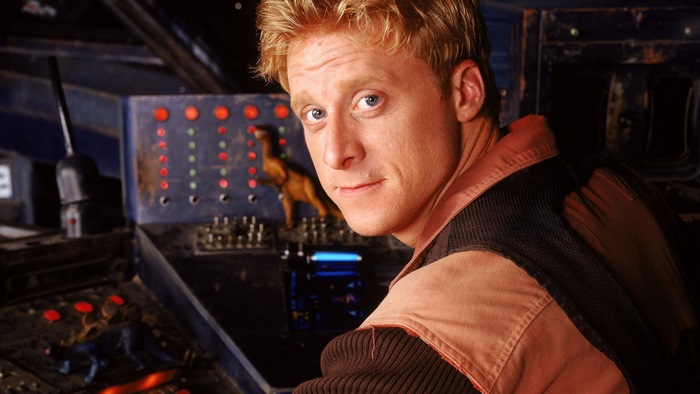 Alan Tudyk in a spaceship cockpit