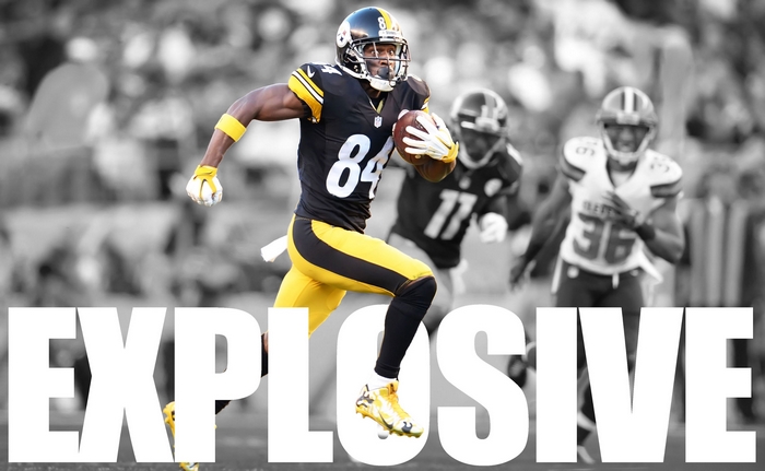 Antonio Brown running with football