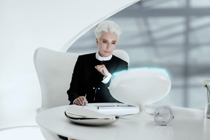 Emma Thompson in a futuristic office