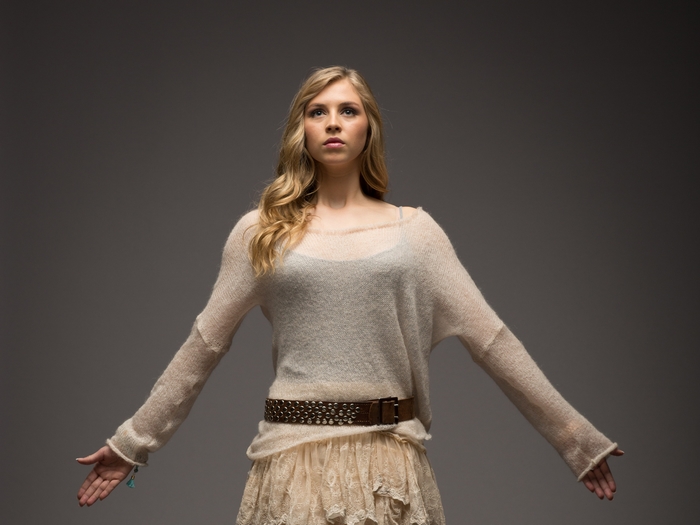Hermione Corfield Standing with Arms Outstretched