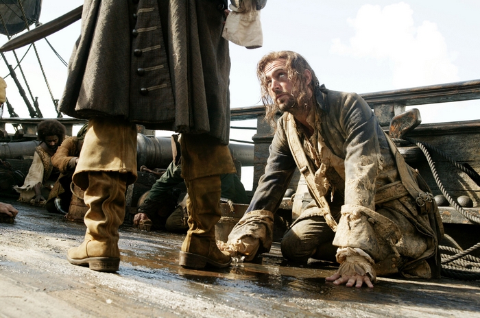 Jack Davenport on a ship deck