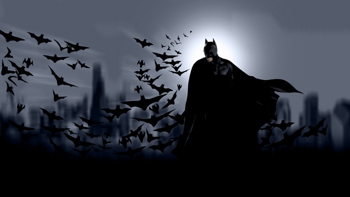 Batman with bats and city skyline