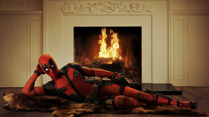 Deadpool by a fireplace