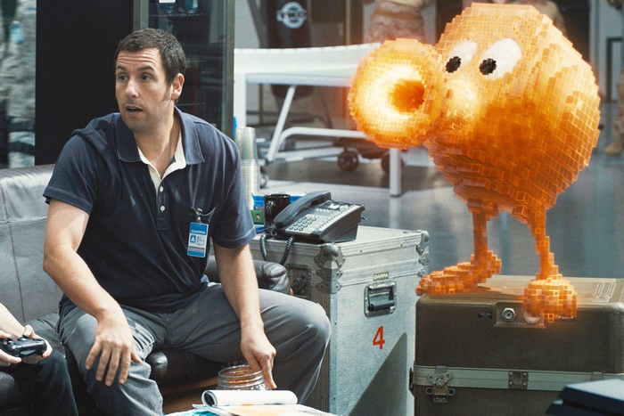 Adam Sandler and a pixelated creature