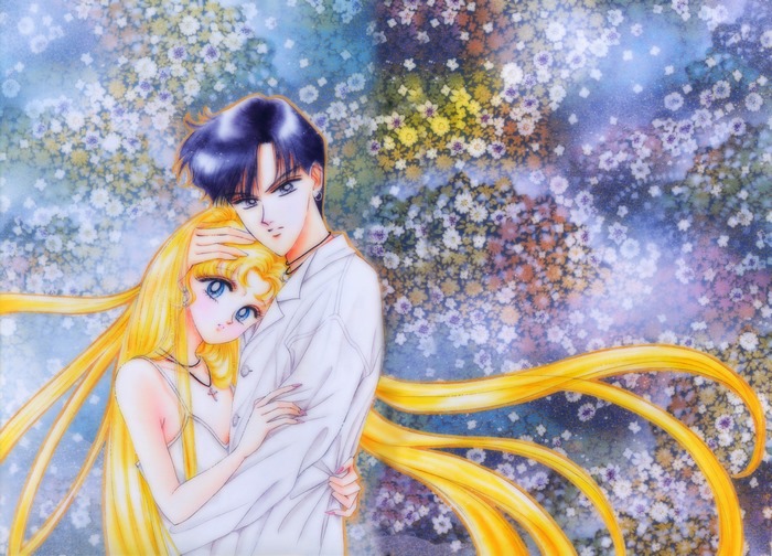 Sailor Moon and Tuxedo Mask embrace