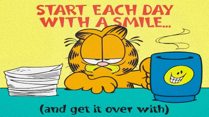 Garfield with coffee and papers