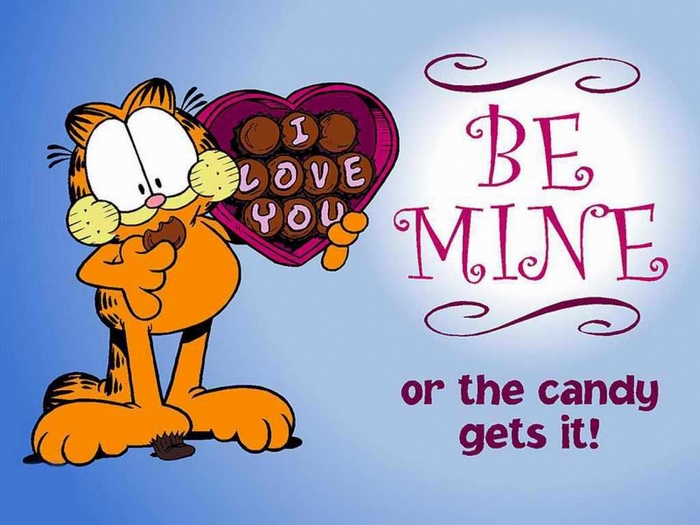 Garfield holding a heart-shaped box of chocolates