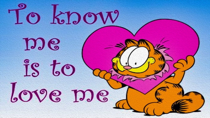 Garfield holding a pink heart