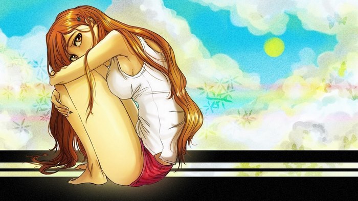 Orihime Inoue sitting in a field