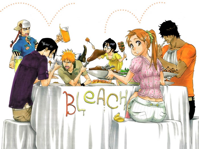 Group of people at a table with food