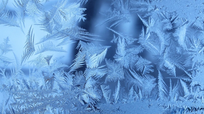 Close-up of frost patterns on glass
