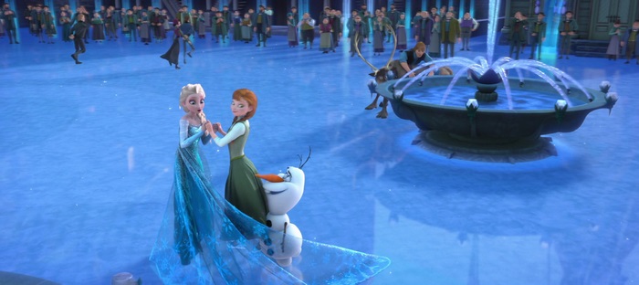 Elsa and Anna from Frozen with Olaf and a fountain