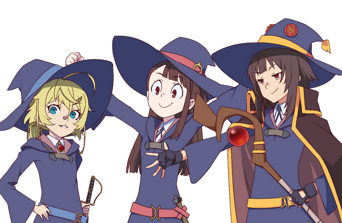 Three witches in blue robes and hats