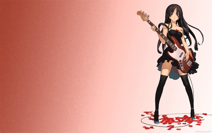 Mio Akiyama playing bass guitar