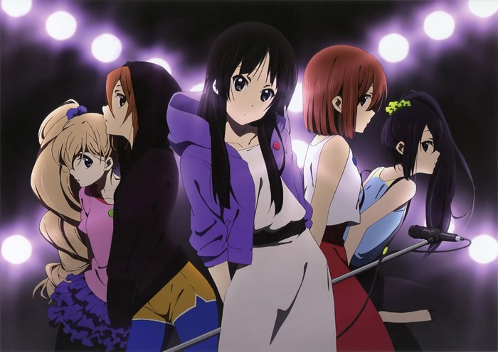 Mio Akiyama and friends performing on stage