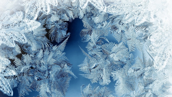 Close-up of frost patterns on glass
