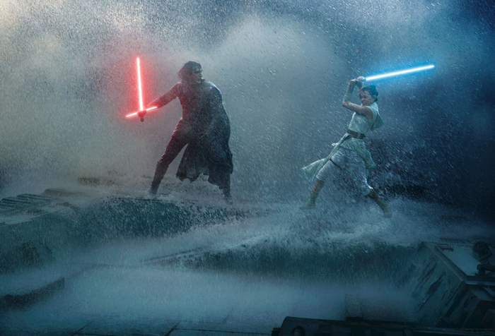 Kylo Ren and Rey fighting with lightsabers in the rain