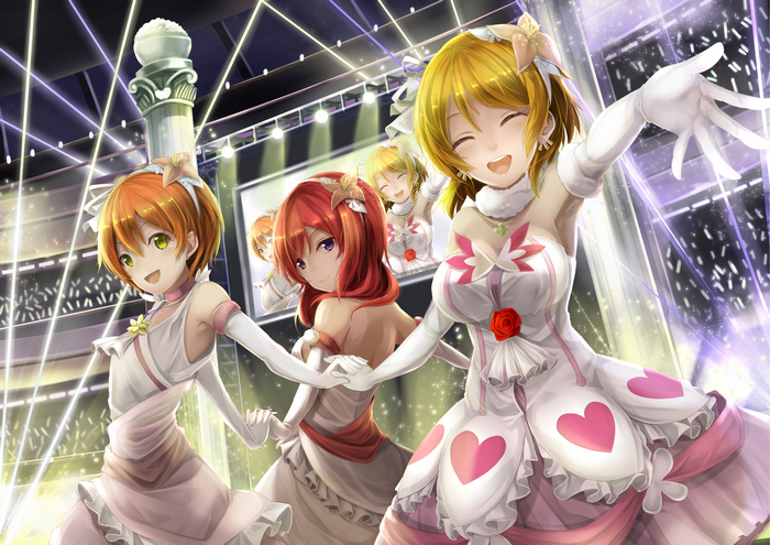 Maki Nishikino and friends performing on stage