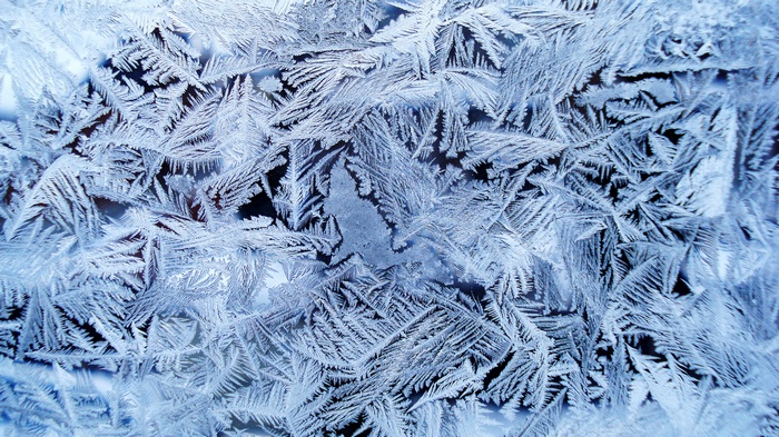 Close-up of frost patterns on glass