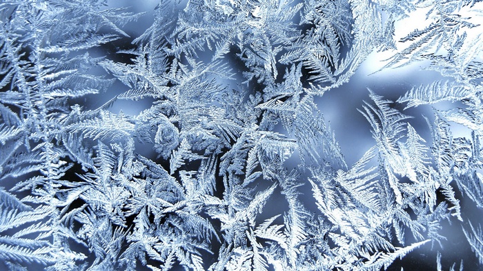 Close-up of frost patterns on glass