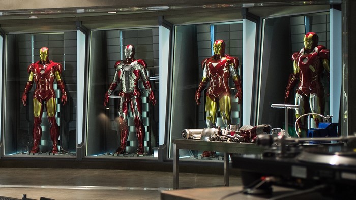 Iron Man suits in Tony Stark's workshop
