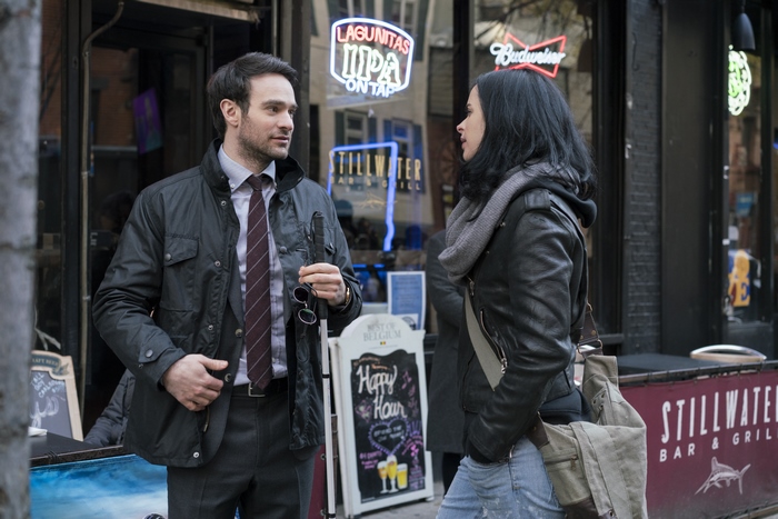 Daredevil and Jessica Jones talking outside Stillwater Bar