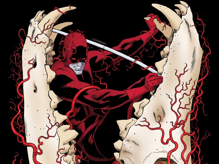 Daredevil fighting within giant jaws