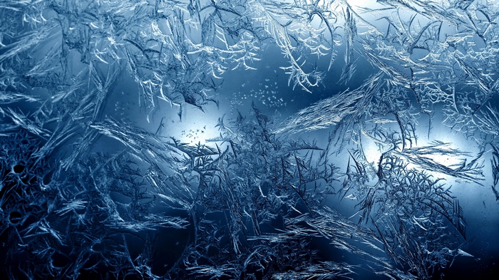Close-up of frost patterns on glass