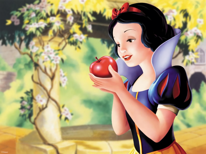 Snow White holding a red apple
