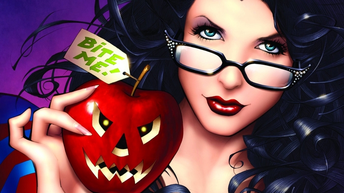 Woman with glasses holding a carved apple