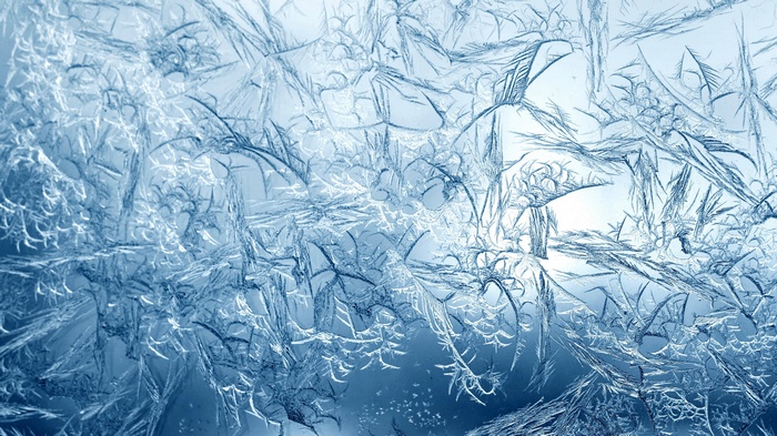 Close-up of frost patterns on glass