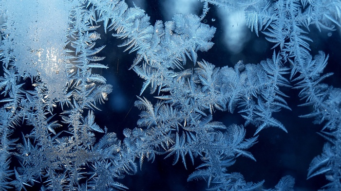 Close-up of frost patterns on glass
