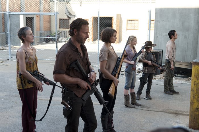 Rick Grimes and group with weapons
