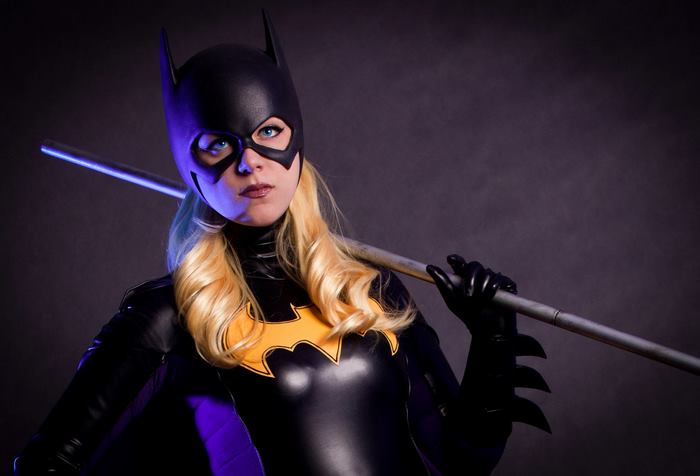 Batgirl holding a metal staff