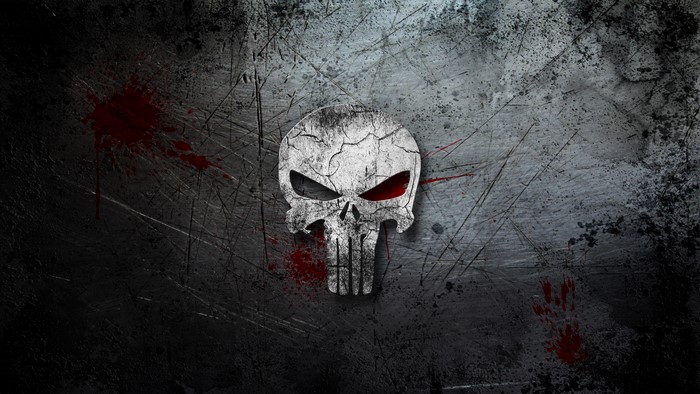 The Punisher skull on a scratched metal background