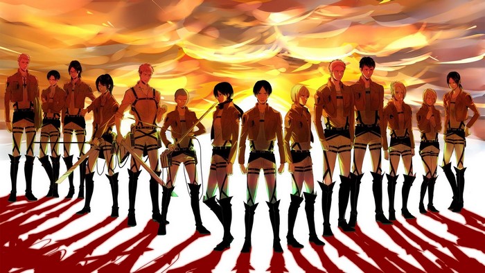 Attack on Titan characters standing against a sunset
