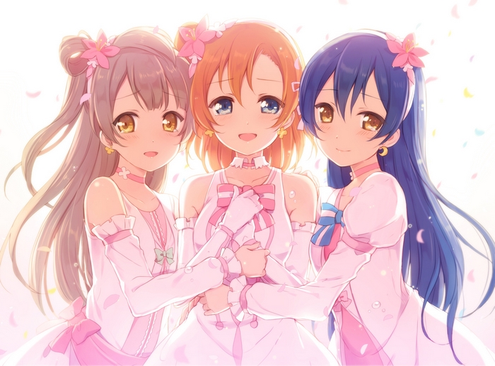 Kotori Minami and two other girls in pink dresses