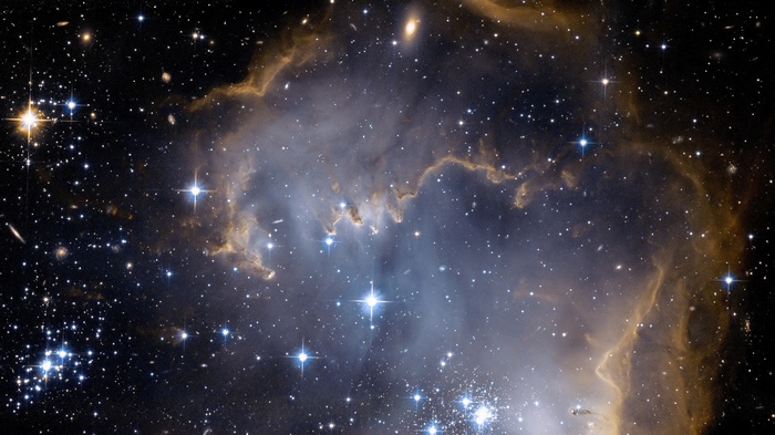 Starry Nebula with Golden and Blue Gas Clouds