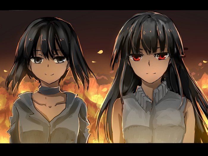 Two girls in front of a fire