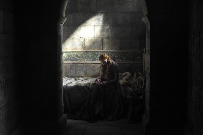 Sansa Stark in a dark room